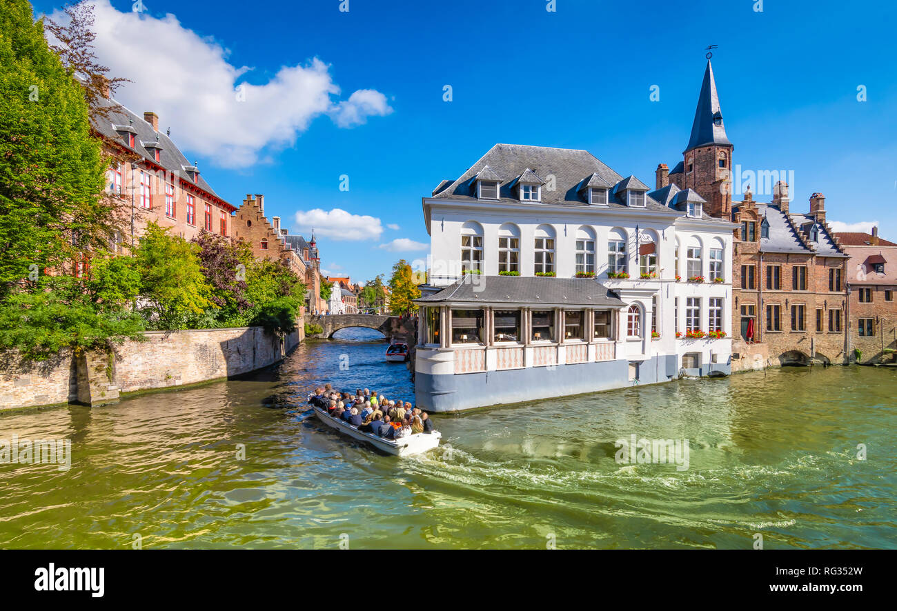 Boat trip on canal in Bruges, Belgium Stock Photo