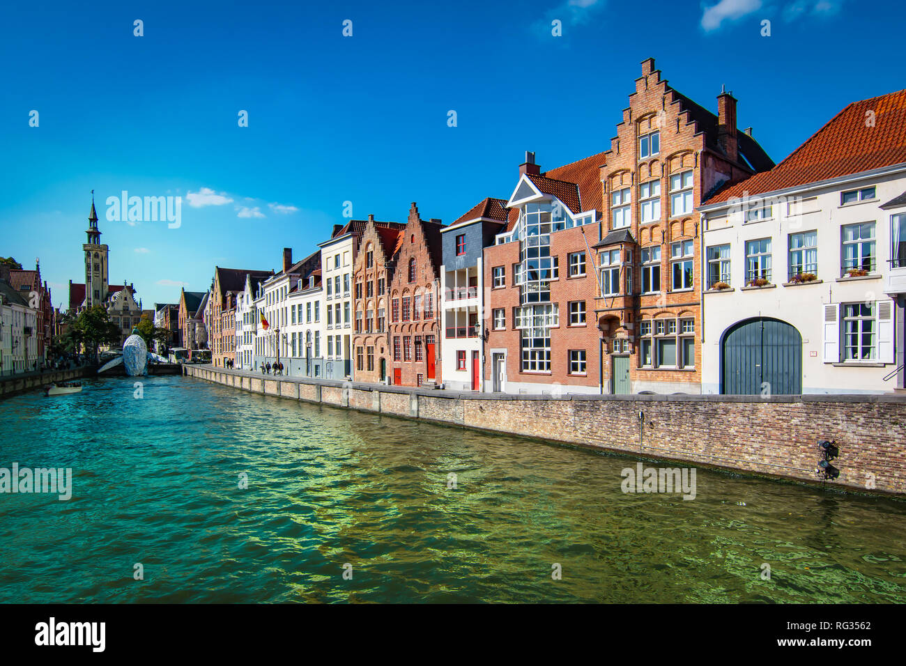 Scenic city view of Bruges canal with beautiful medieval houses. Stock Photo