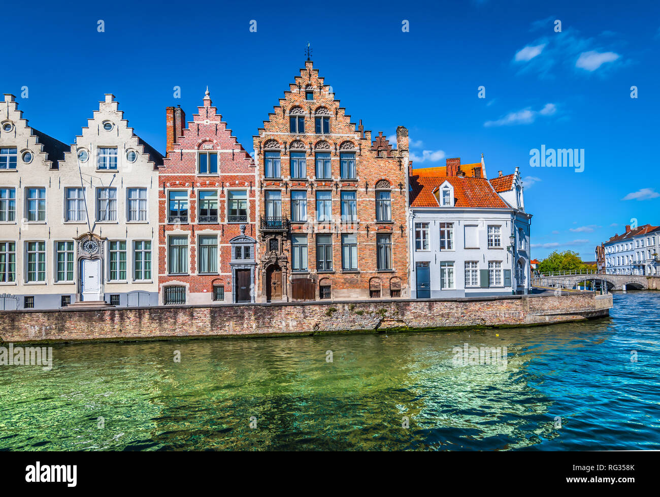 Canal in Bruges with beautiful Belgian brick houses. Stock Photo