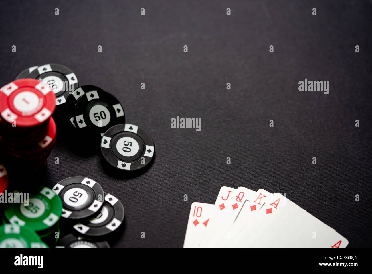 Casino chips and playing cards on minimalistic black background . Casino  game. Online casino. Gambling concept, poker mobile app. Poker game theme.  Ro Stock Photo - Alamy