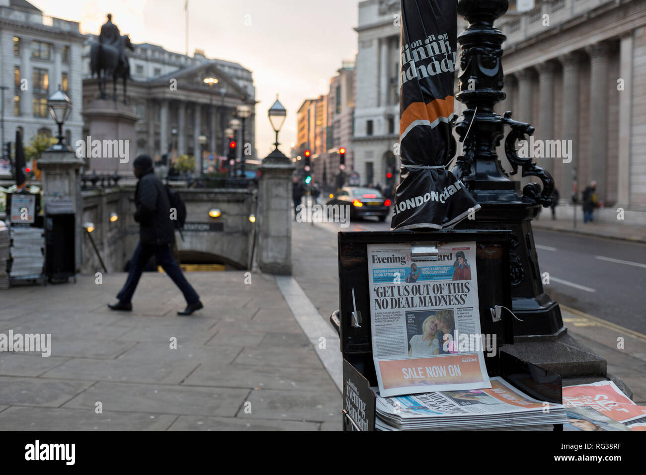 Outside the Bank of England in the City of London, copies of the London Evening Standard newspaper with the headline about Brexit 'Get us out of this No Deal Madness', on 24th January 2019, in London, England. Stock Photo