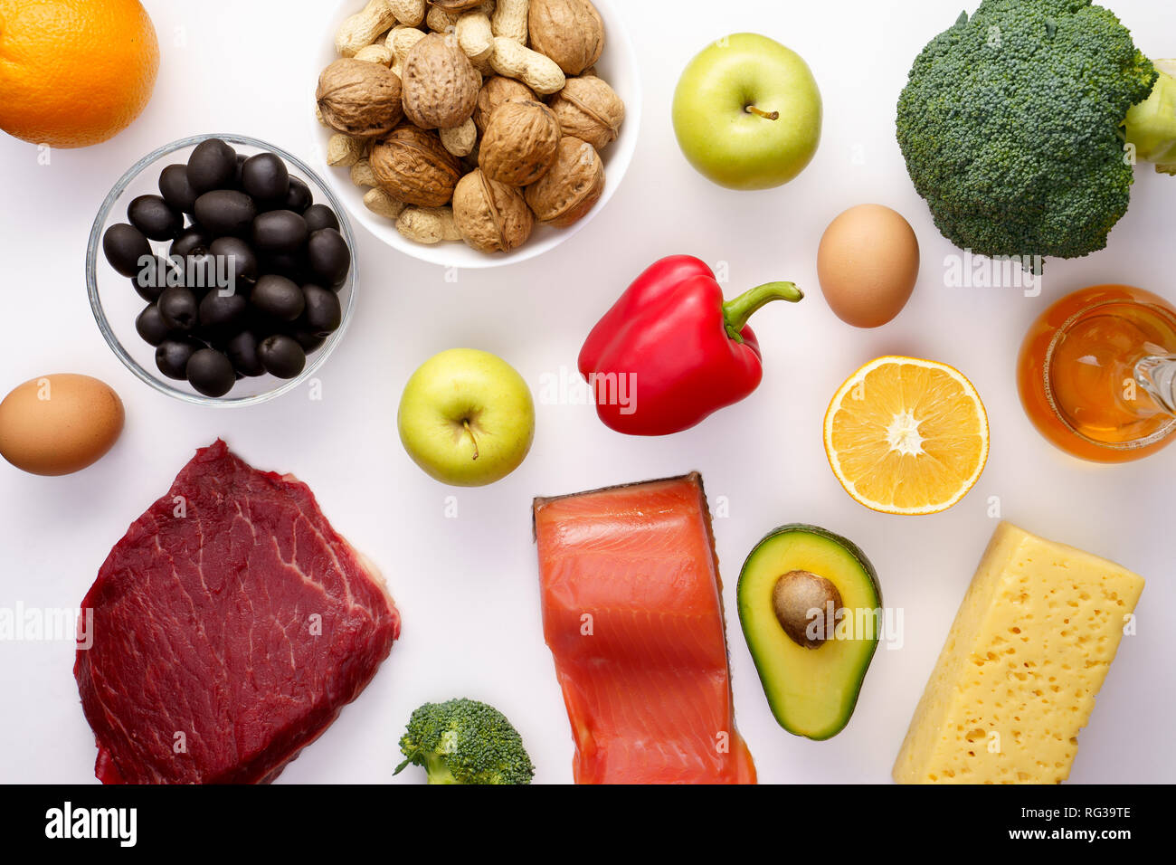 Photo on top of piece of meat, fish, cheese, eggs, vegetables, fruits