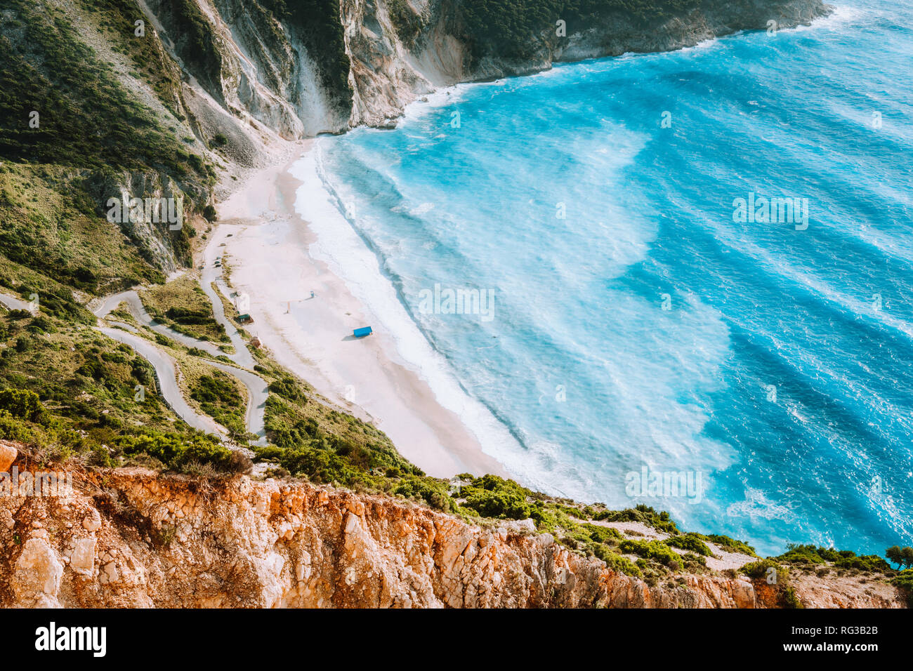 amazing-myrtos-beach-with-rolling-waves-beautiful-coastline-cliffs