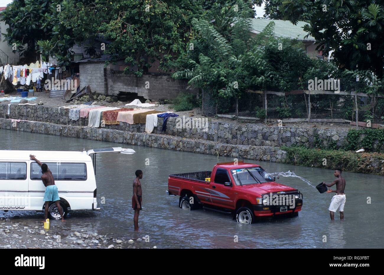 LCA, Saint Lucia: car wash in a river, Canaries. Stock Photo