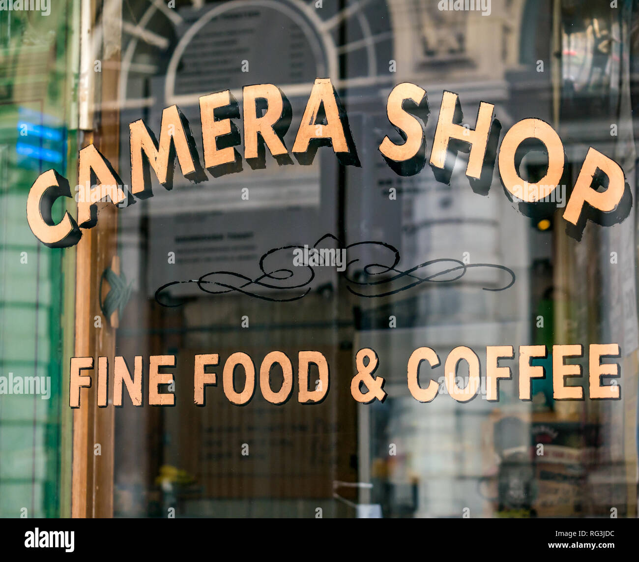 The Camera Coffee Shop window with reflections, Collingwood Street, Newcastle, Tyne and Wear, UK Stock Photo