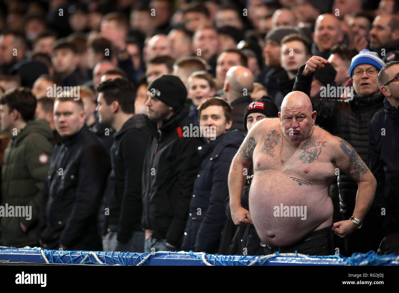 Sheffield Wednesday fan Paul 'Tango' Gregory (second right) in the stands during the FA Cup fourth round match at Stamford Bridge, London. Stock Photo