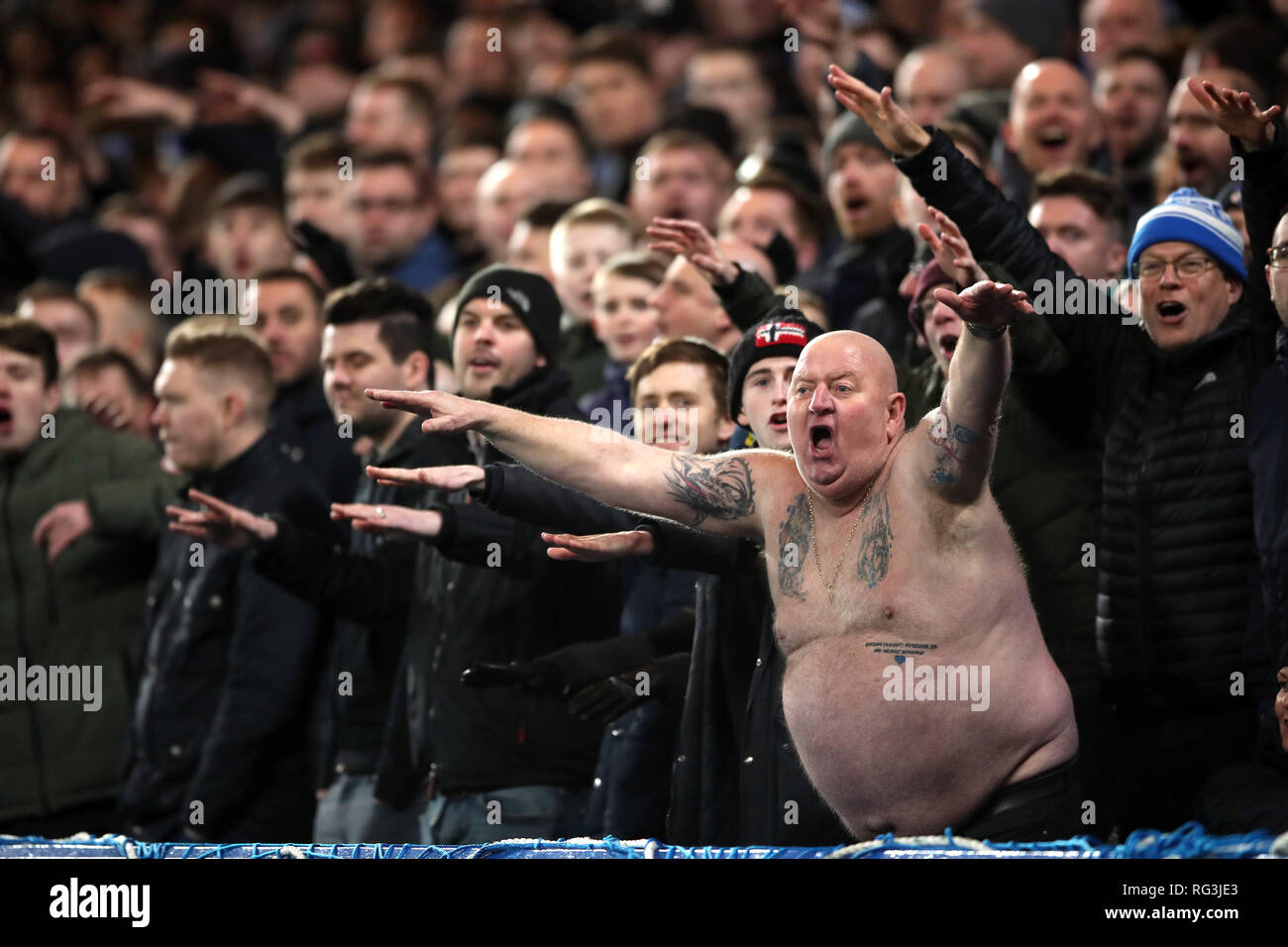 Sheffield Wednesday fan Paul 'Tango' Gregory (second right) in the stands during the FA Cup fourth round match at Stamford Bridge, London. Stock Photo
