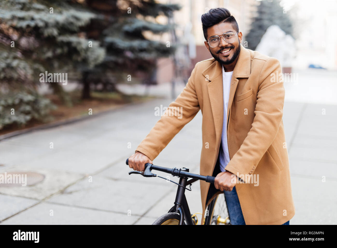 Portrait of indian man with brown hair 