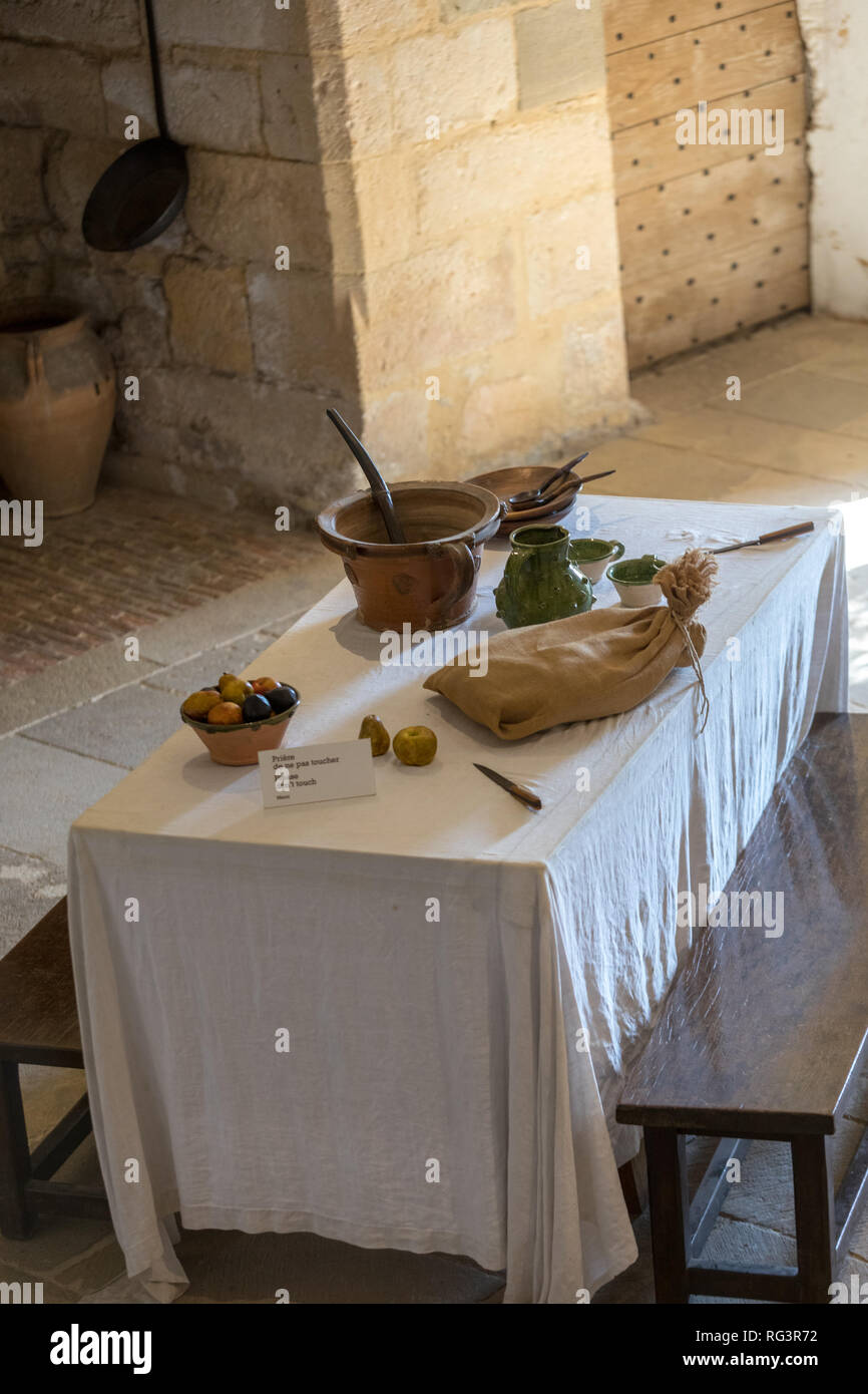 Castelnaud, Dordogne, France - September 7, 2018: Atique interior of the kitchen in Castelnaud Castle, medieval fortress at Castelnaud-la-Chapelle, Do Stock Photo