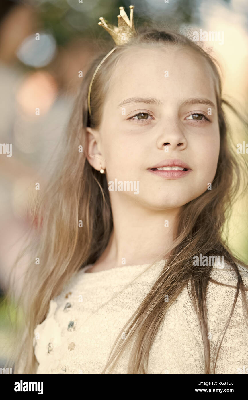 Girl Kid On Calm Face With Tiny Golden Crown On Head Nature