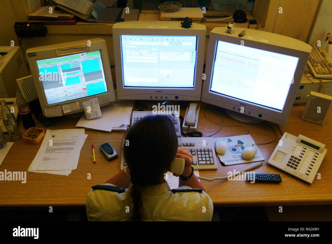 DEU, Germany, Essen: Daily police life. Officer from a city police station. Radio room, operating control system. Stock Photo