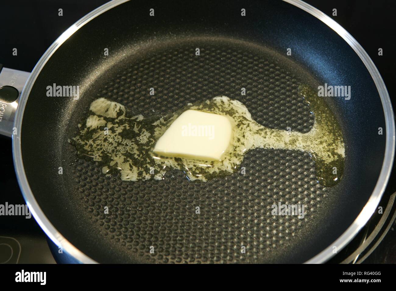 DEU, Germany : butter is melting in a pan Stock Photo - Alamy