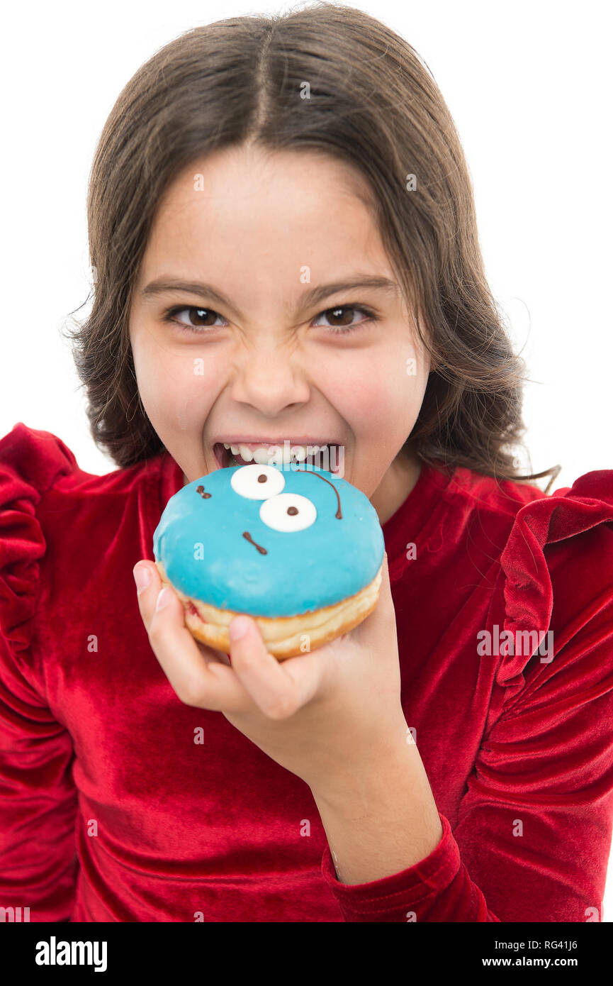 Kid girl hungry for sweet donut. Donut so popular. Sugar levels