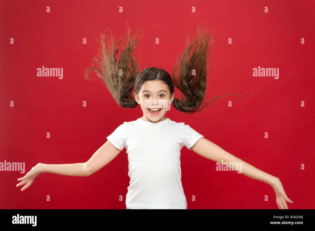 Beauty In Motion Happy Little Girl With Stylish Ponytail