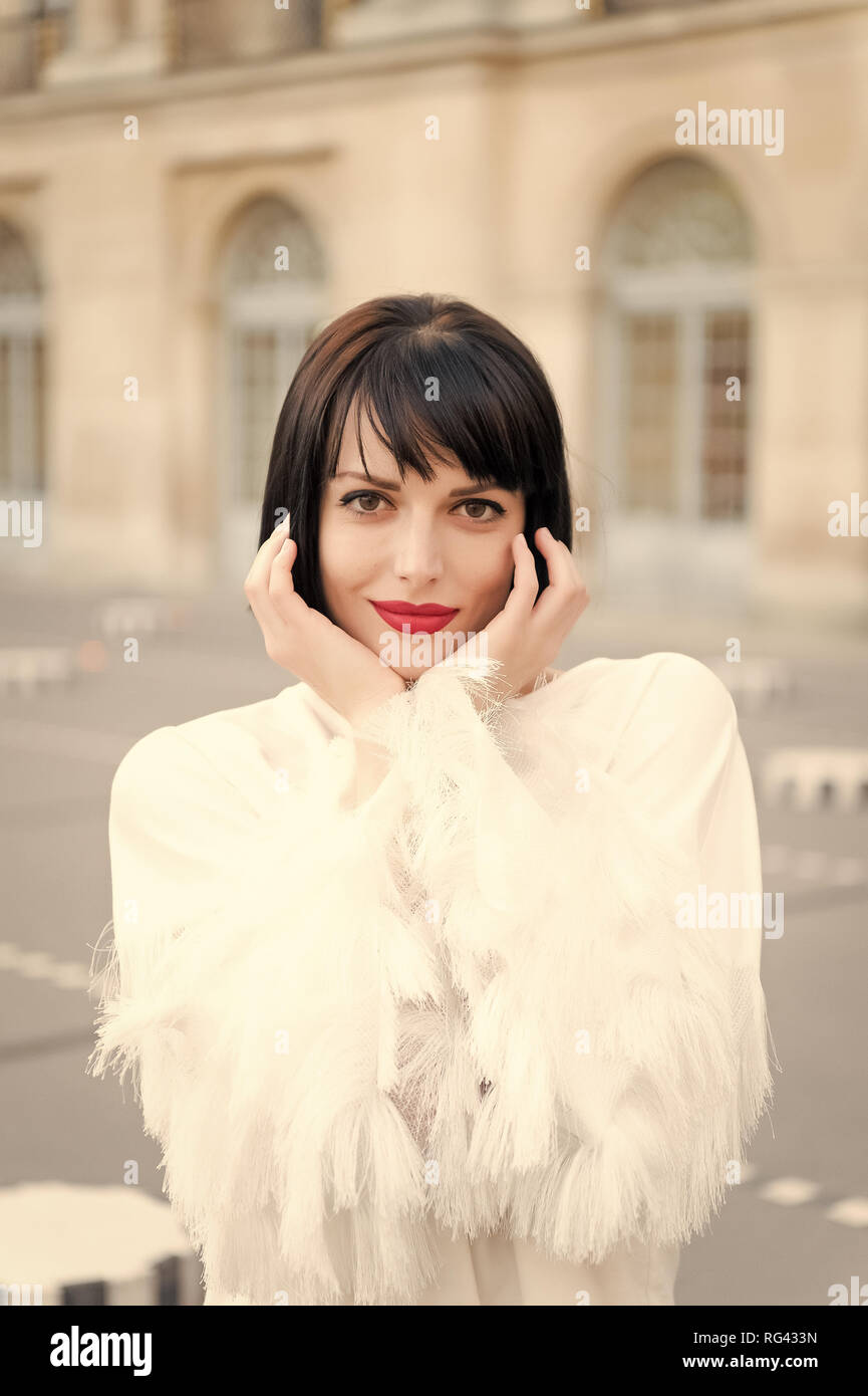 Outdoor photo of romantic european woman with brunette hairstyle spending  time outdoor, exploring european city Paris, France Stock Photo - Alamy