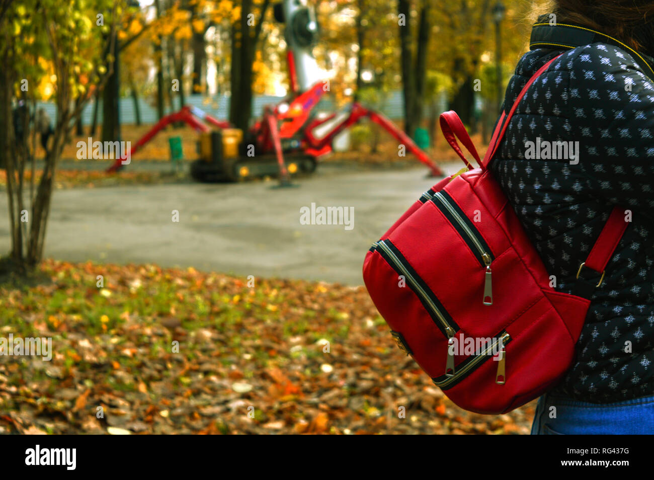 Woman backpack yellow jacket hi-res stock photography and images - Alamy