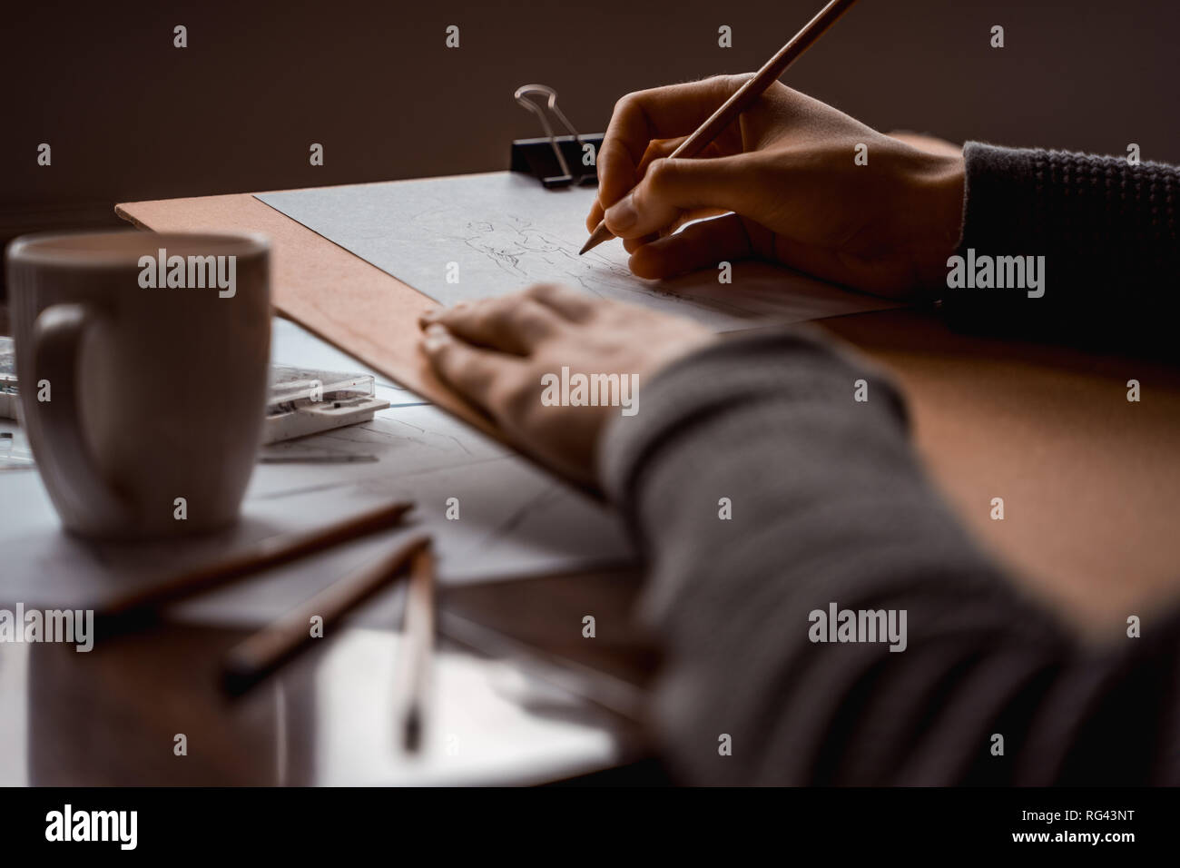 Artist work station for drawing figure sketches. Stock Photo