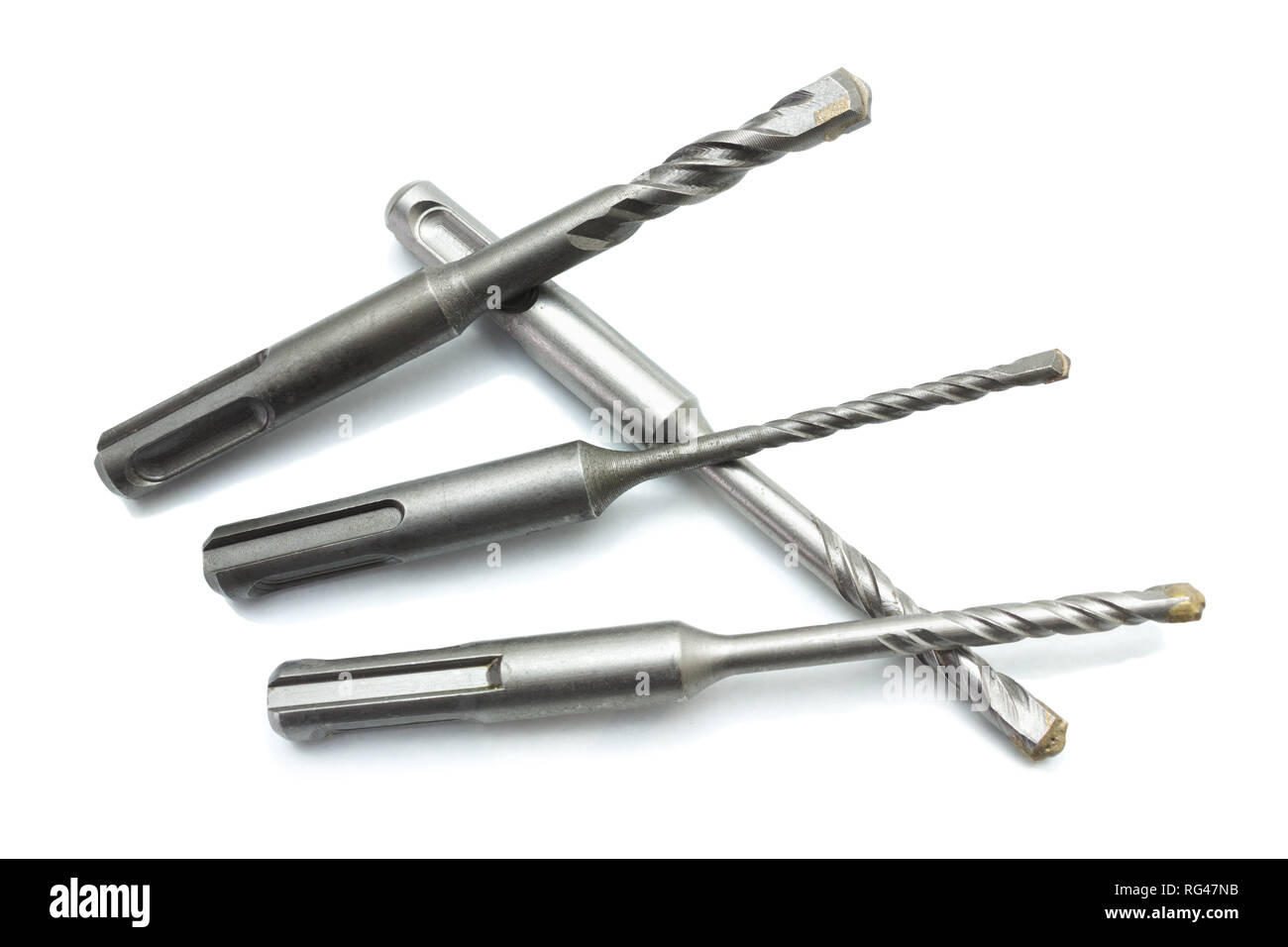 Four Drill bit for concrete different diameter isolated on white