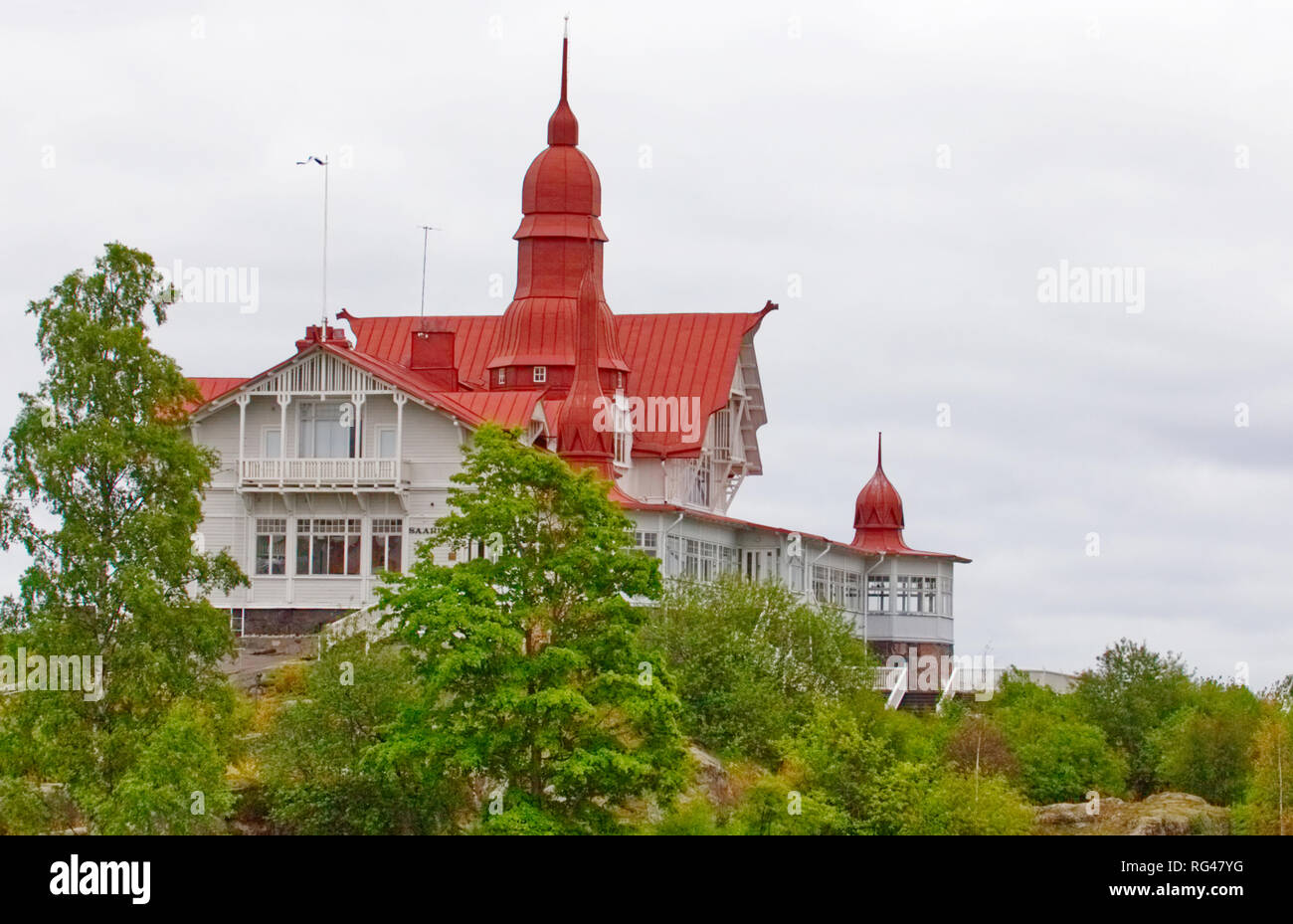 July 2, 2018 - Helsinki, Finland- The red roofed mansion on Luoto Island Stock Photo