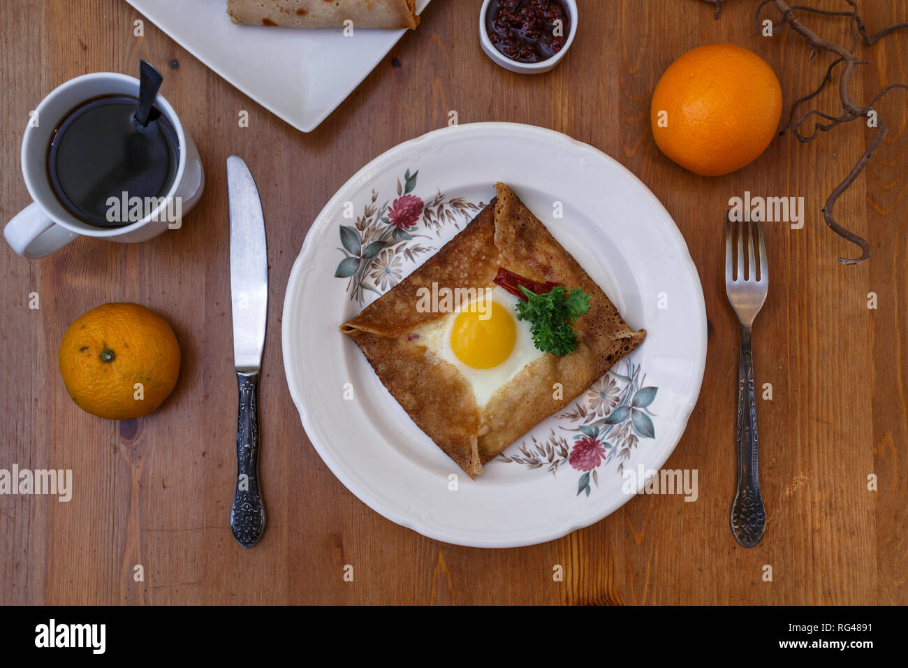Galette sarrasin, buckwheat crepe, with ham cheese and egg, french brittany cuisine Stock Photo