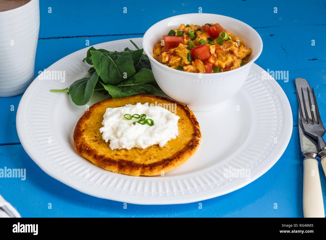 Traditional colombian breakfast huevos pericos with corn cakes Stock Photo Alamy