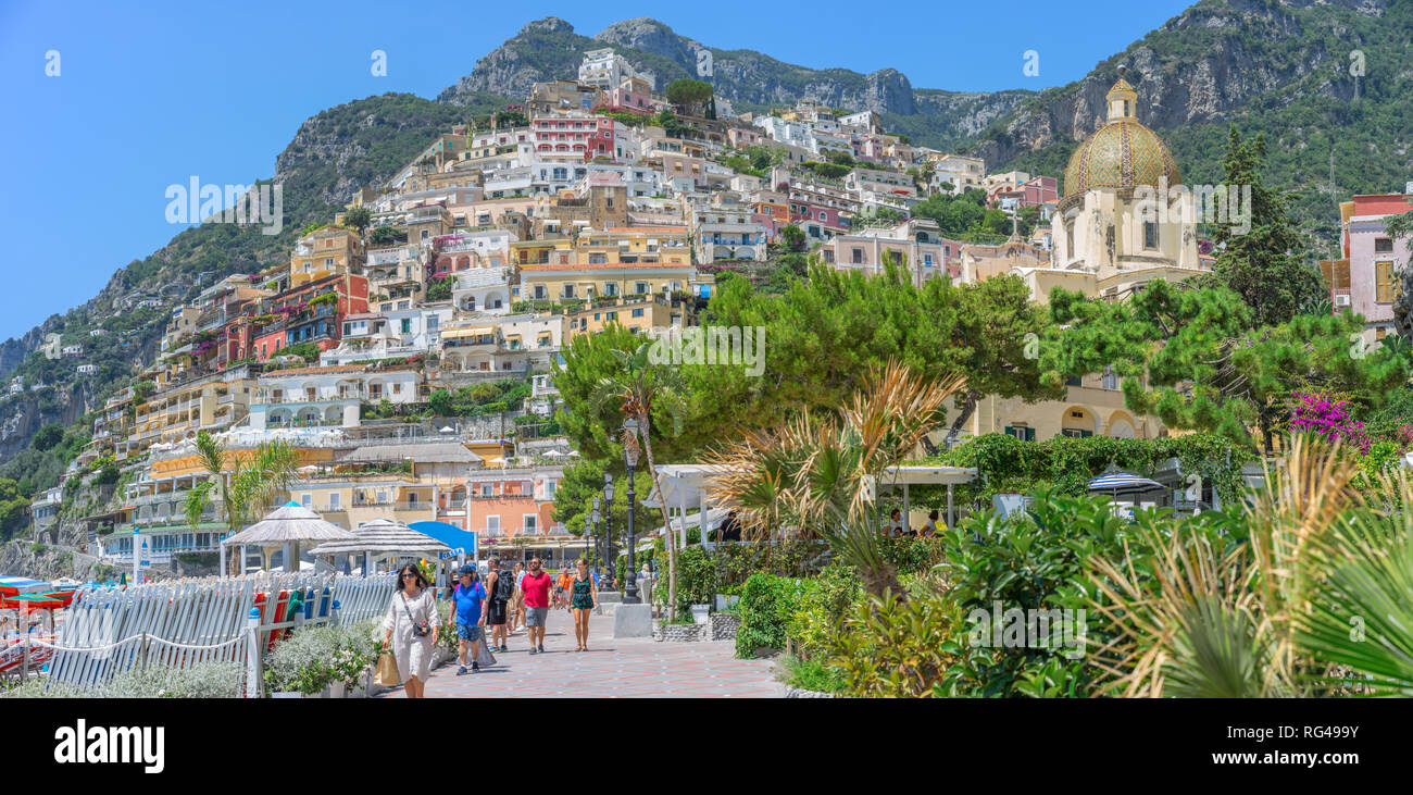The Church of Santa Maria Assunta and the hillside town of Positano on the Amalfi coast Stock Photo