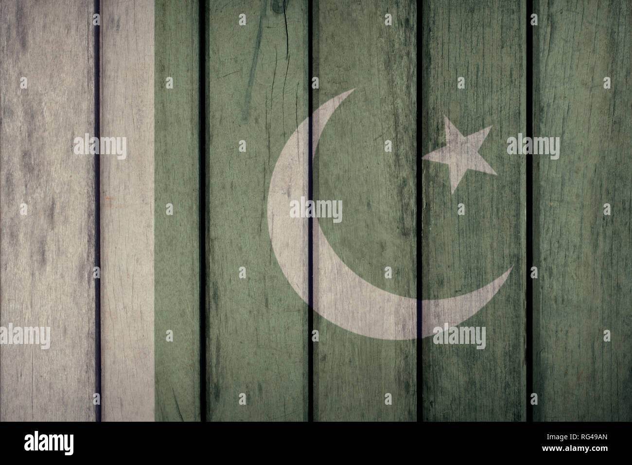 Pakistan Politics News Concept: Pakistani Flag Wooden Fence Stock Photo