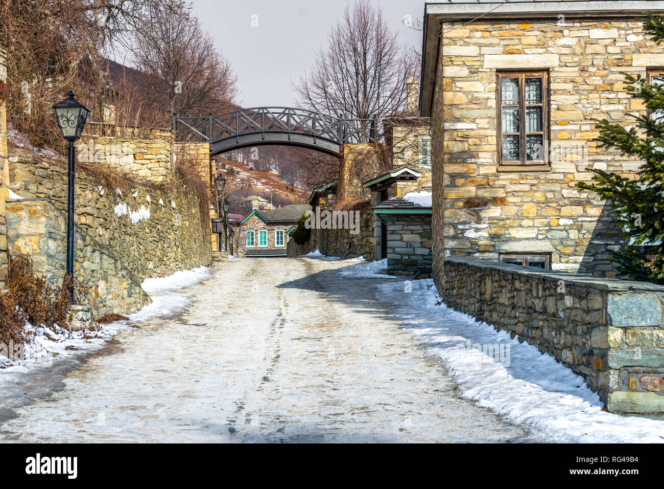 View of traditional stone buildings and streets with snow at the famous