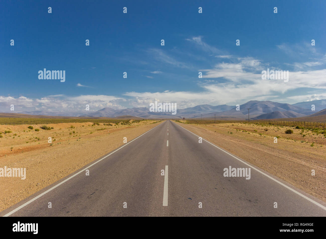Road heading to the Andes mountain range in Argentina Stock Photo