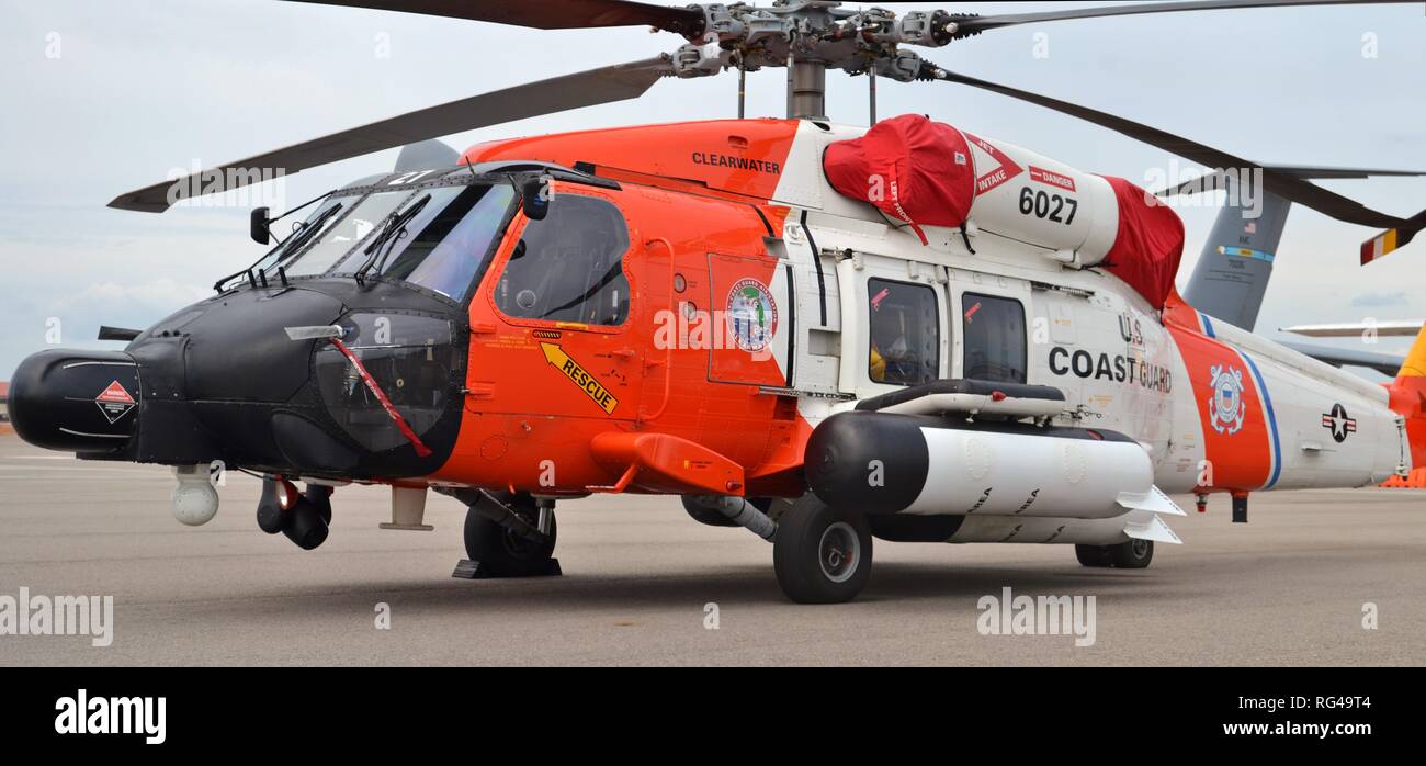 A U.S. Coast Guard MH-60 Jayhawk rescue helicopter parked on the runway at MacDill Air Force Base in Florida. Stock Photo