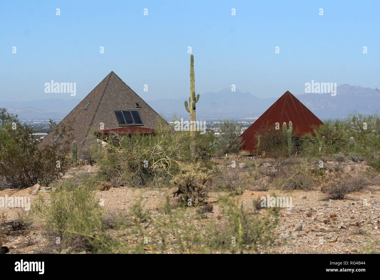 In the desert outside of Phoenix, Arizona a house is built in the shape of a pyramid. Stock Photo
