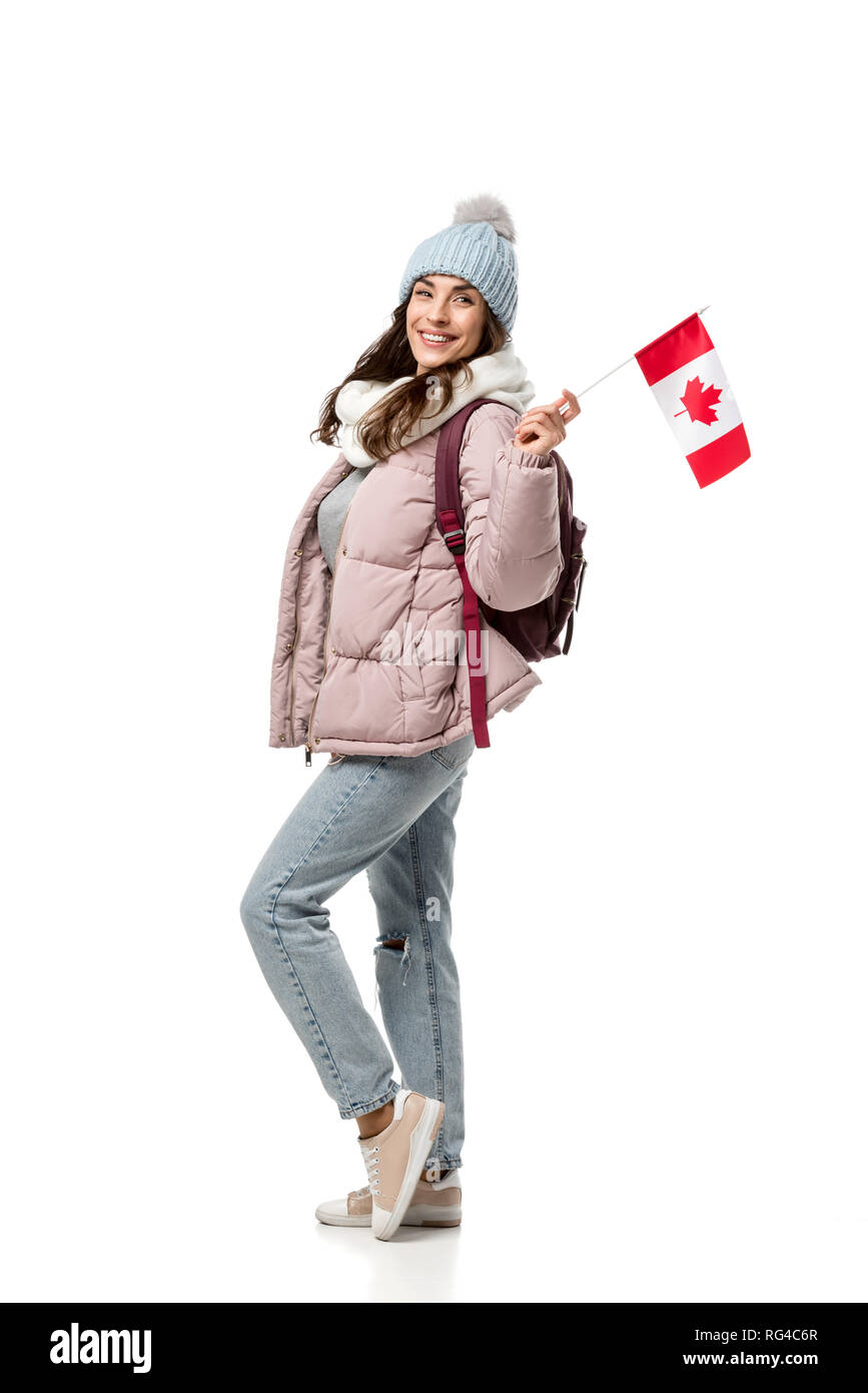 happy female student in winter clothes with canadian flag isolated on  white, studying abroad concept Stock Photo - Alamy