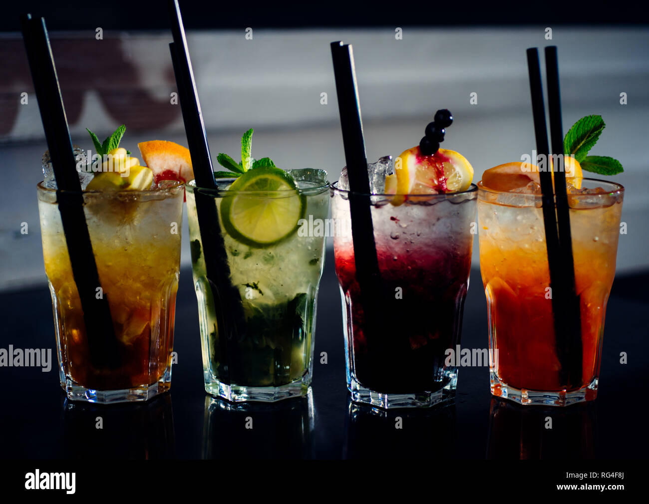 A full measure of bars. Cocktail drinks served in glasses with