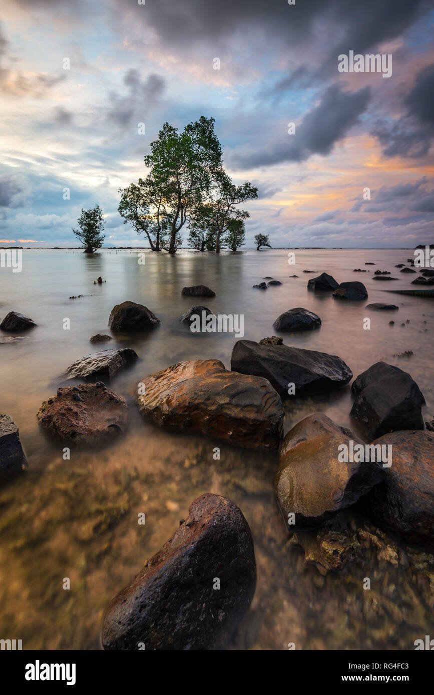 Wonderful Sunset in Labuan, Indonesia Stock Photo - Alamy