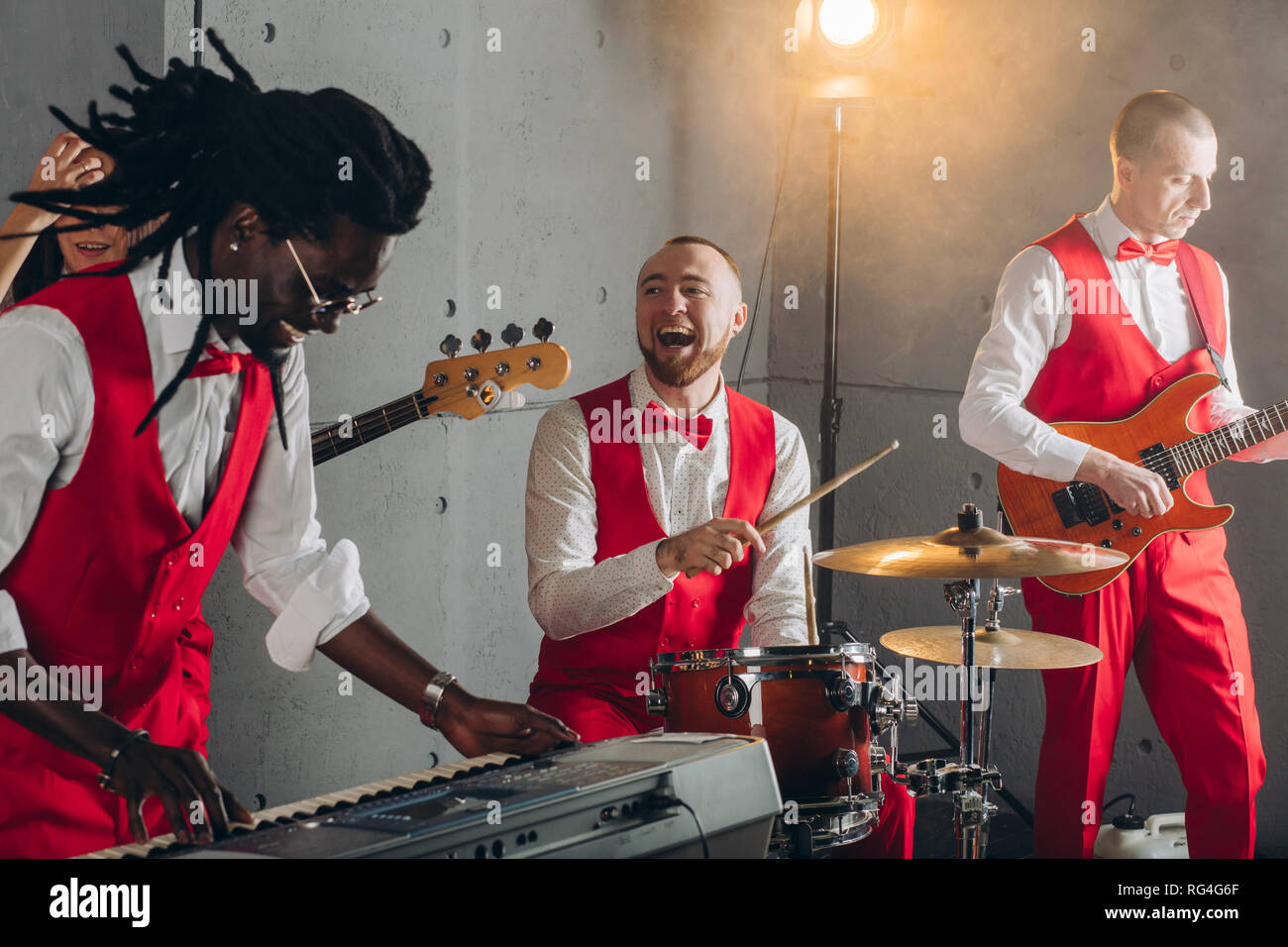 crazy rock band during the performance Stock Photo Alamy