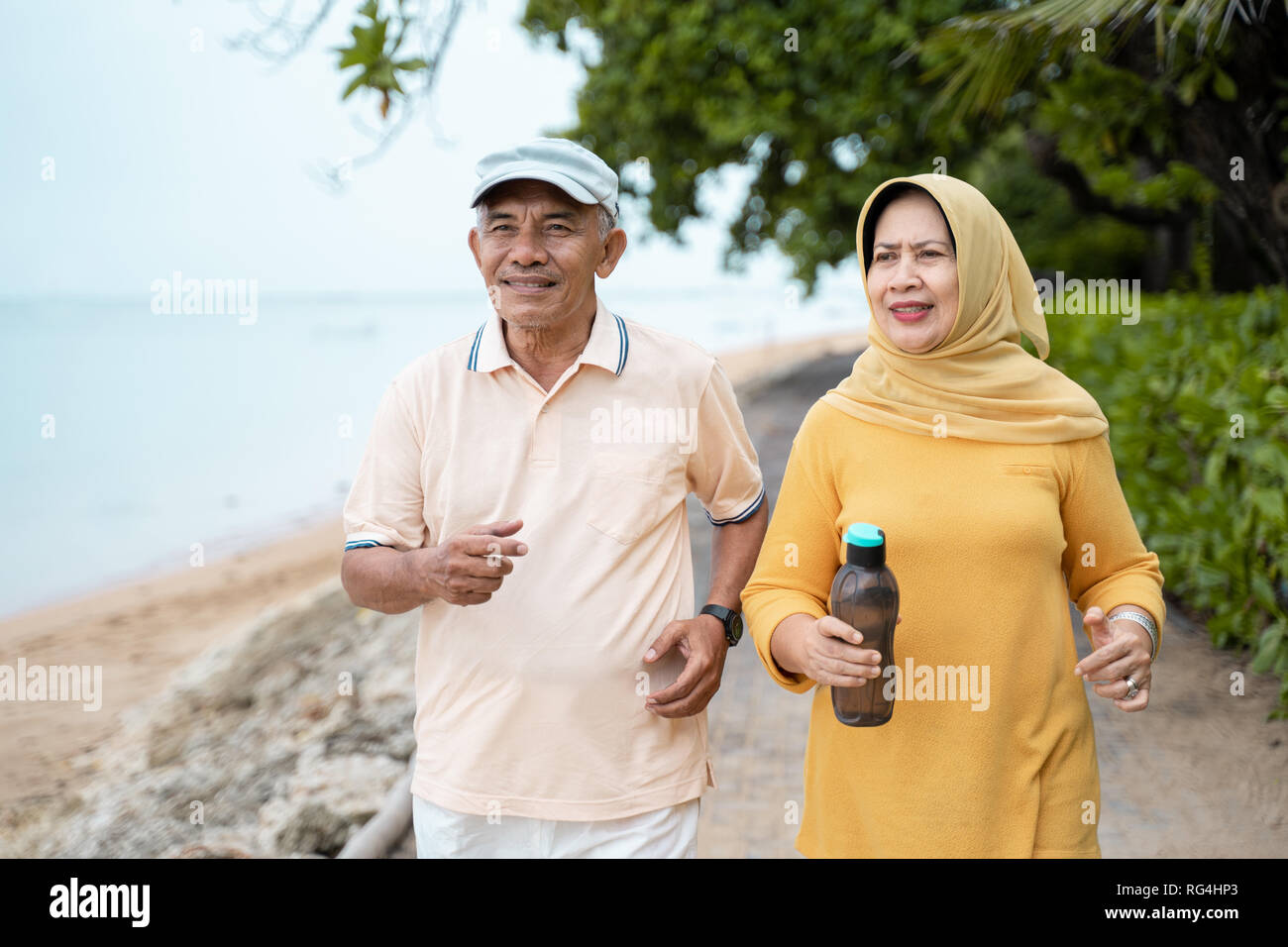 muslim mature couple doing jogging together Stock Photo