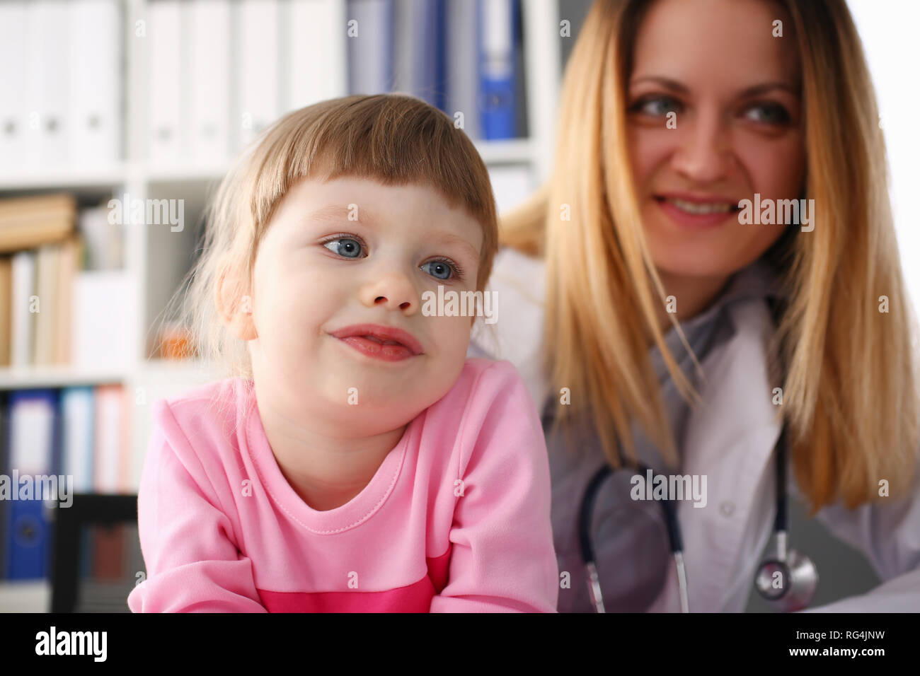 Little child at pediatrician reception Stock Photo Alamy