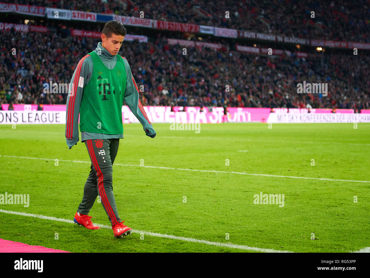 James RODRIGUEZ, FCB 11 Gymnastics, stretching, warming up, warm-up, preparation for the game, sad, disappointed, angry, Emotions, disappointment, frustration, frustrated, sadness, desperate, despair,  FC BAYERN MUNICH - VFB STUTTGART 4-1  - DFL REGULATIONS PROHIBIT ANY USE OF PHOTOGRAPHS as IMAGE SEQUENCES and/or QUASI-VIDEO -  1.German Soccer League , Munich, January 27, 2019     Stock Photo
