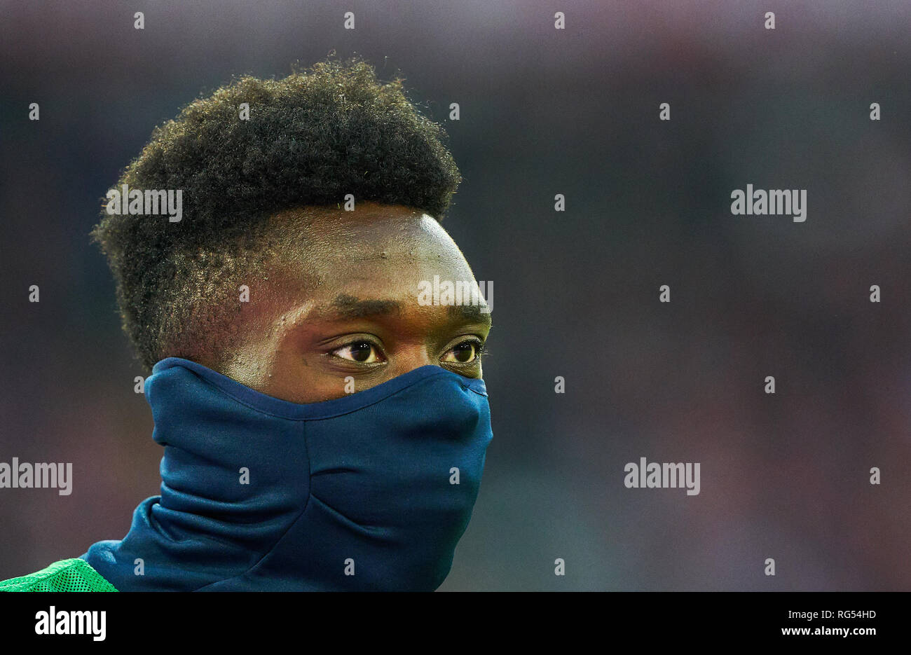 Alphonso DAVIES, FCB 19. Gymnastics, stretching, warming up, warm-up, preparation for the game,  half-size, portrait,  FC BAYERN MUNICH - VFB STUTTGART 4-1  - DFL REGULATIONS PROHIBIT ANY USE OF PHOTOGRAPHS as IMAGE SEQUENCES and/or QUASI-VIDEO -  1.German Soccer League , Munich, January 27, 2019     Stock Photo