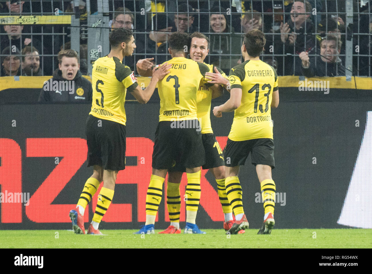 From left to right: Achraf HAKIMI (DO), Jadon SANCHO (DO), goalkeeper Mario GOETZE (Gv? Tze, DO) and Raphael GUERREIRO (DO) celebrate the goal to make it 3-0 for Borussia Dortmund, jubilation, cheering, cheering, joy, cheers, celebrate, goaljubel, full figure, Soccer 1. Bundesliga, 19. matchday, Borussia Dortmund (DO) - Hanover 96 (H) 5: 1, on 26.01.2019 in Dortmund/Germany. ¬ | usage worldwide Stock Photo