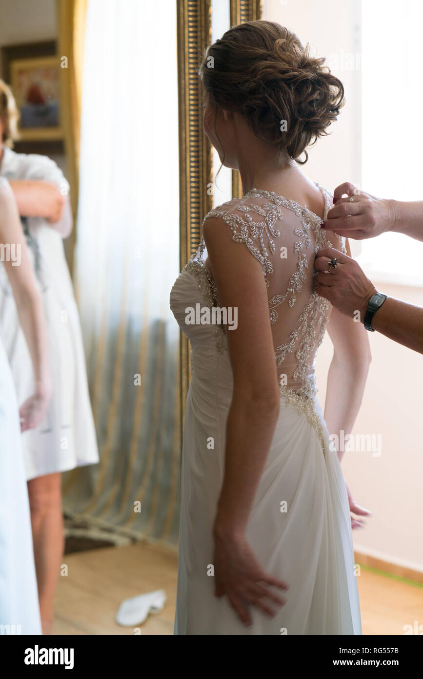 The Bride Put On A Wedding Dress Going To The Wedding Stock Photo