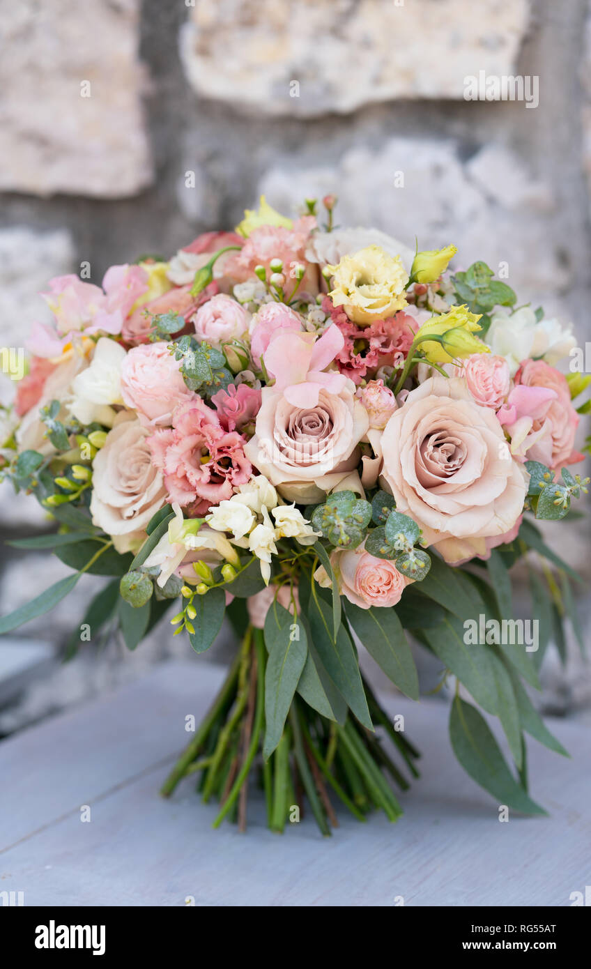 Pink Wedding Bouquet Of Various Flowers And Eucalyptus Stock Photo Alamy
