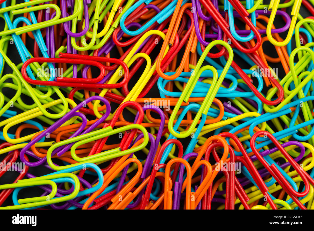 Bunch of multi color paper clips Stock Photo