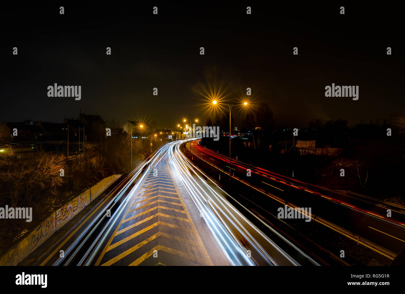 Abstract light trails road yellow hi-res stock photography and images ...