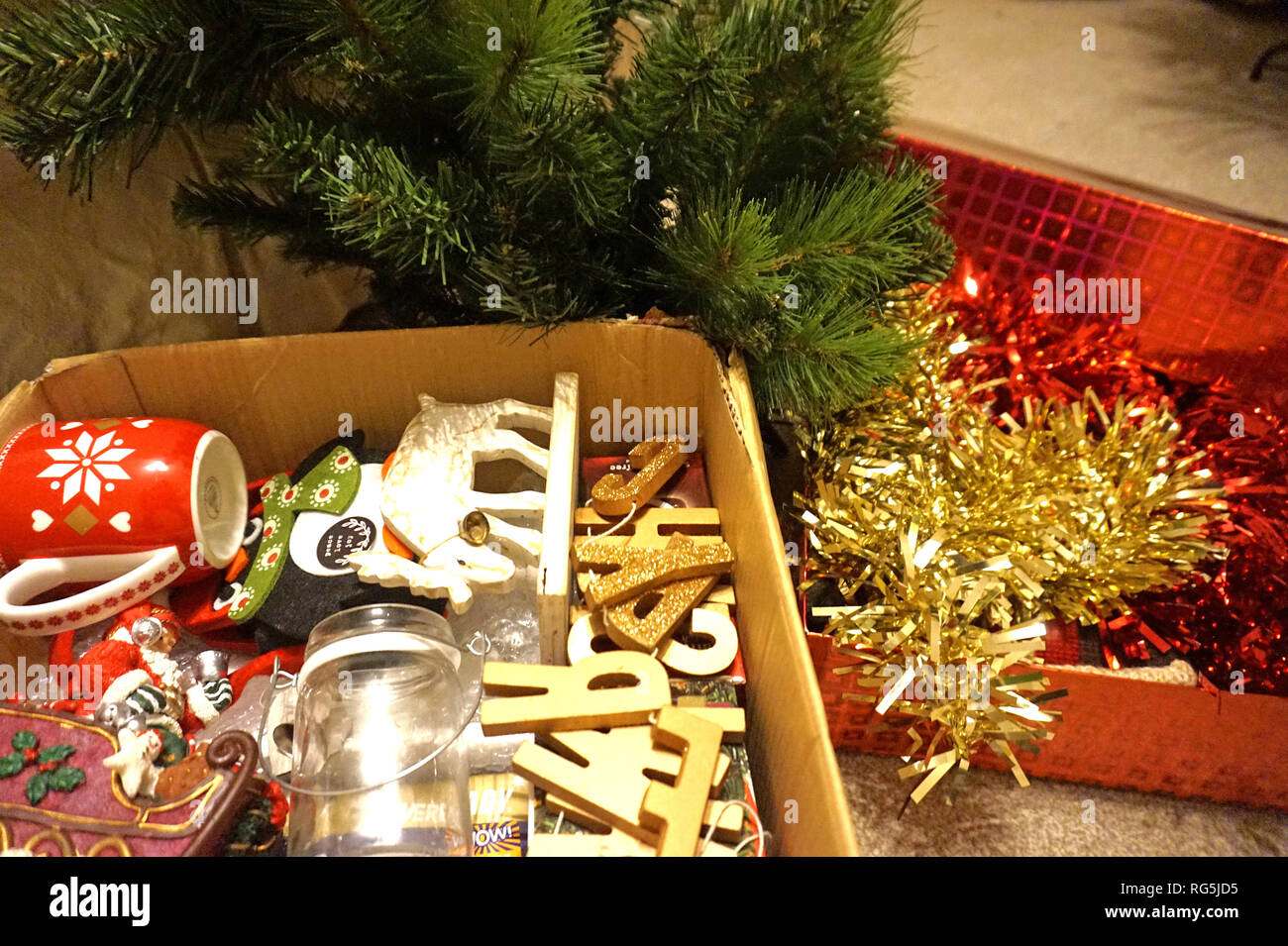 Christmas Decorations In Boxes ready to be put out / put away in the