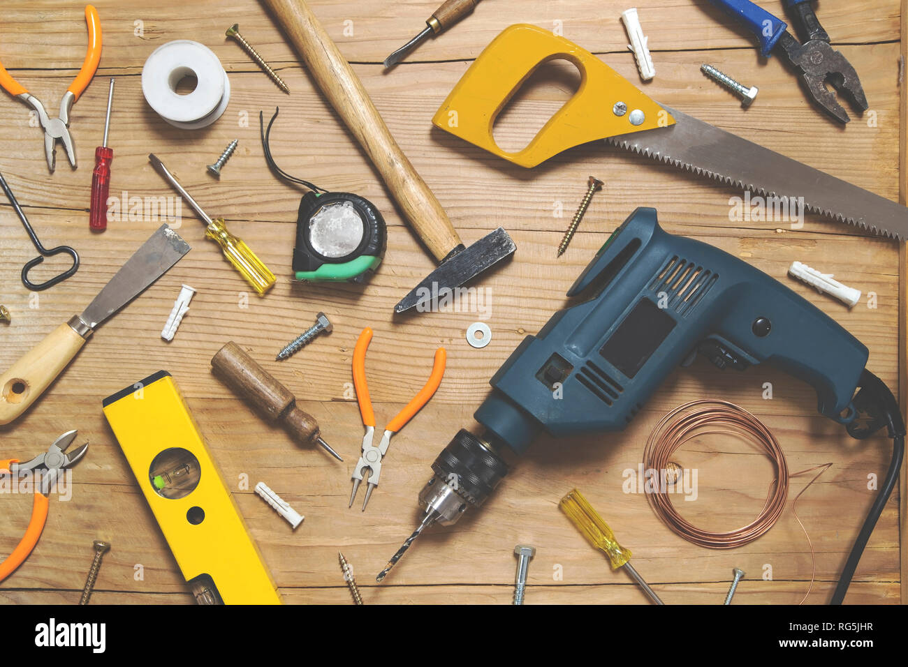 Various tools on wooden background - top view Stock Photo