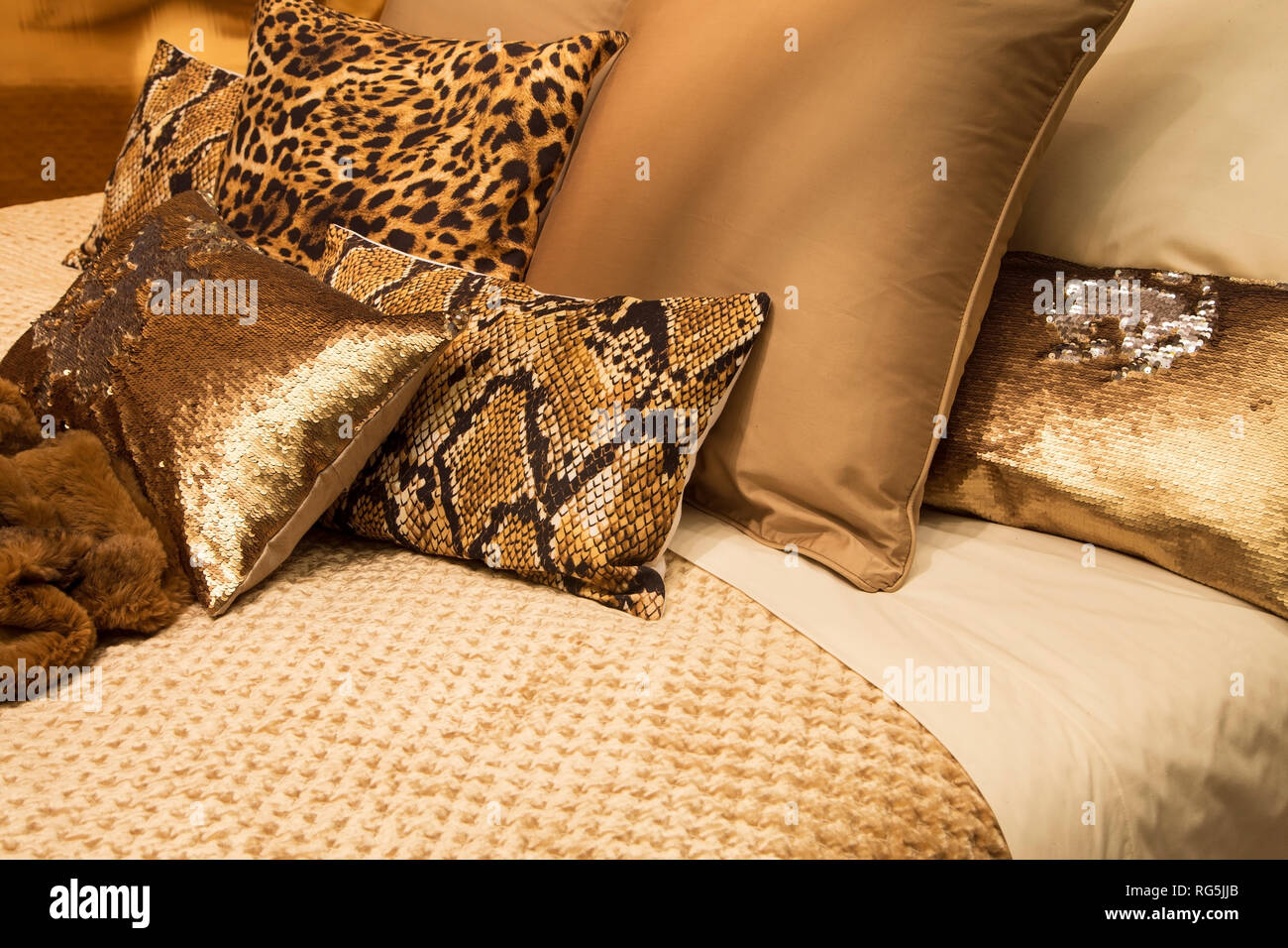 Decorative pillows on a bed Stock Photo Alamy