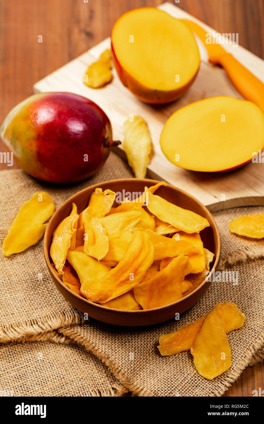 Dried Mango Fruit on Old Wooden Background Stock Photo
