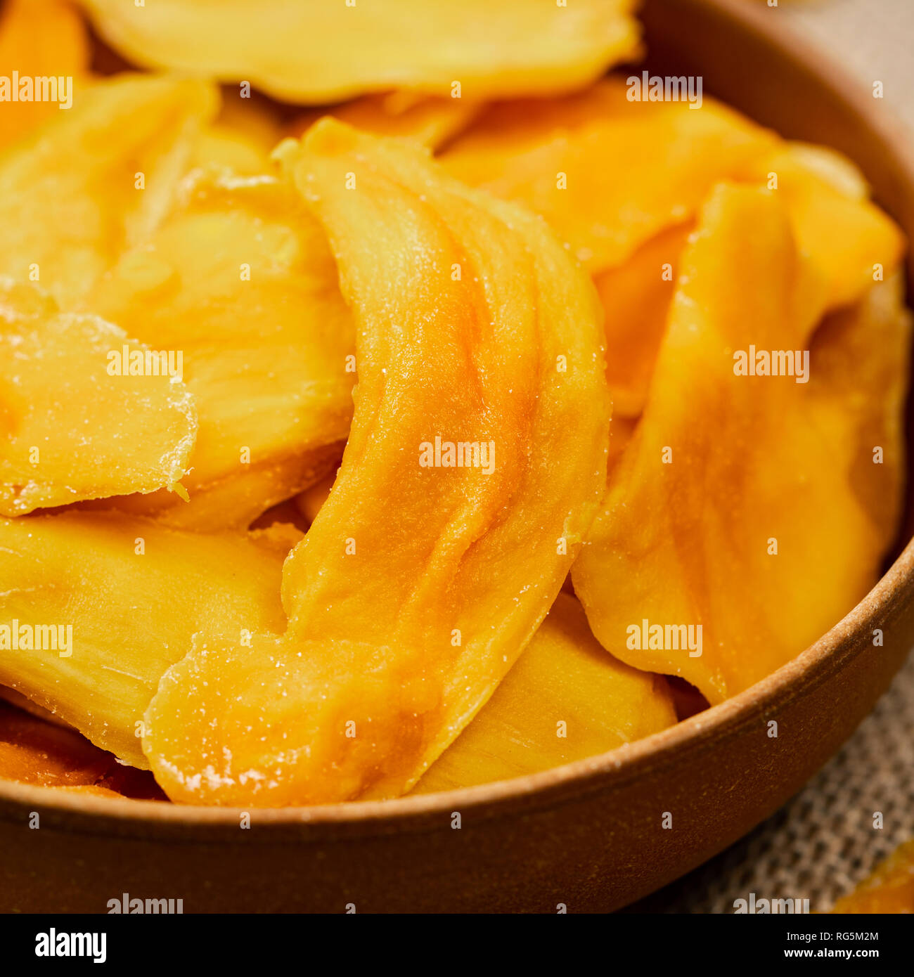 Dried Mango Fruit on Old Wooden Background Stock Photo