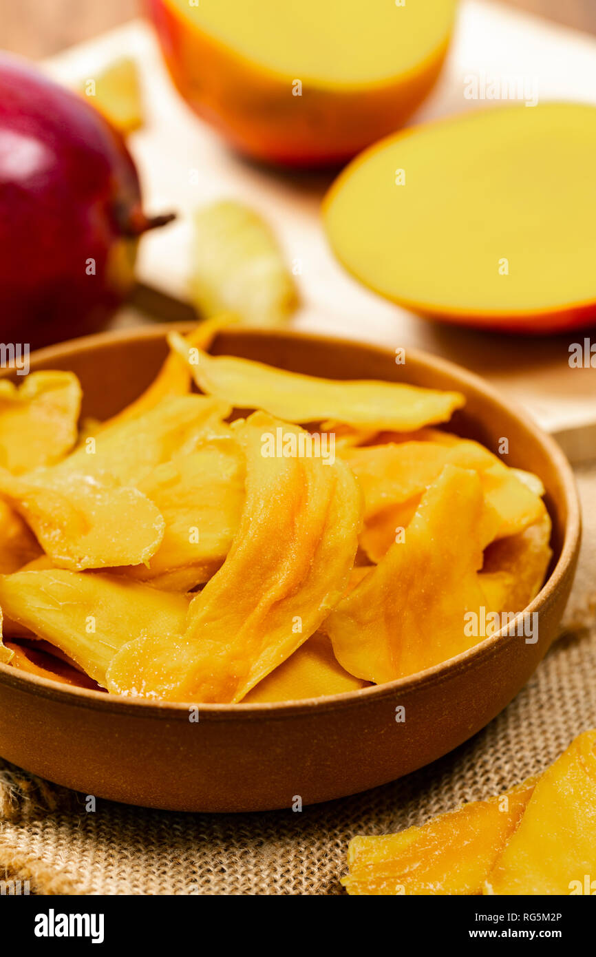 Dried Mango Fruit on Old Wooden Background Stock Photo